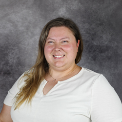 caucasian woman wearing a white shirt