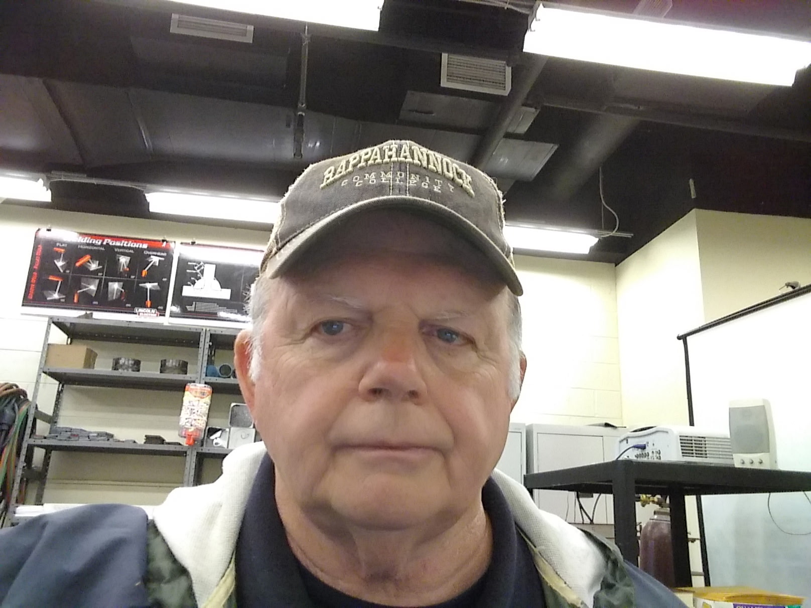 white man in baseball hat
