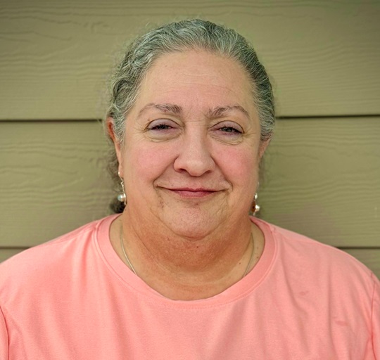 woman in orange shirt